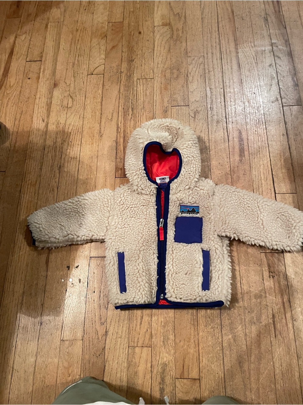 Patagonia Cream Sherpa Hooded Jacket with Blue Trim and Red Lining